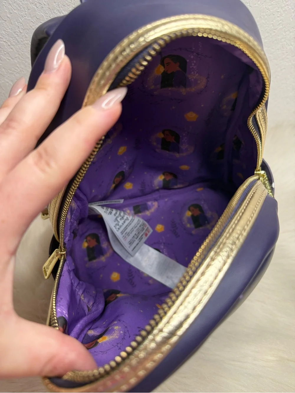 Loungefly Official Disney Parks Wish Asha and Star Mini Backpack
